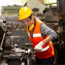 female-engineers-operating-a-cnc-machine-in-factor