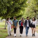 Diverse university students at campus in summertime